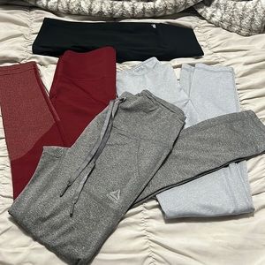 A regular long work out tights and 1 black biker Fabletics shorts